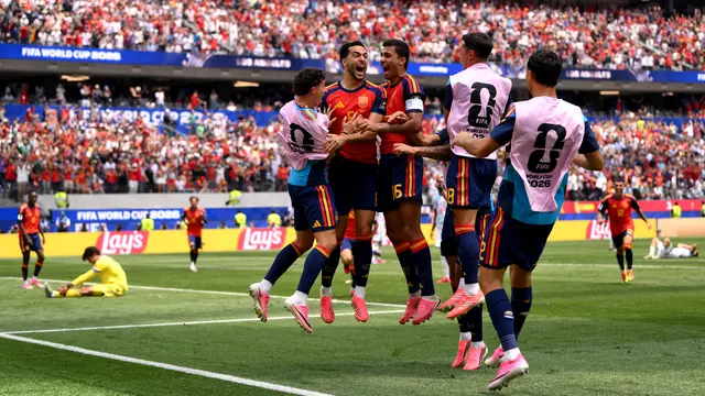 Gol Telat Merino Usai Blunder Kiper MU Antar Spanyol Singkirkan Belgia